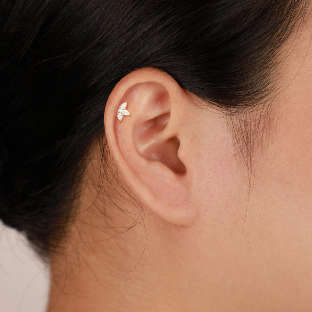 product angle view of 14K solid gold pear-cut lab diamond lotus flower for cartilage piercing flat back stud earring nicke...