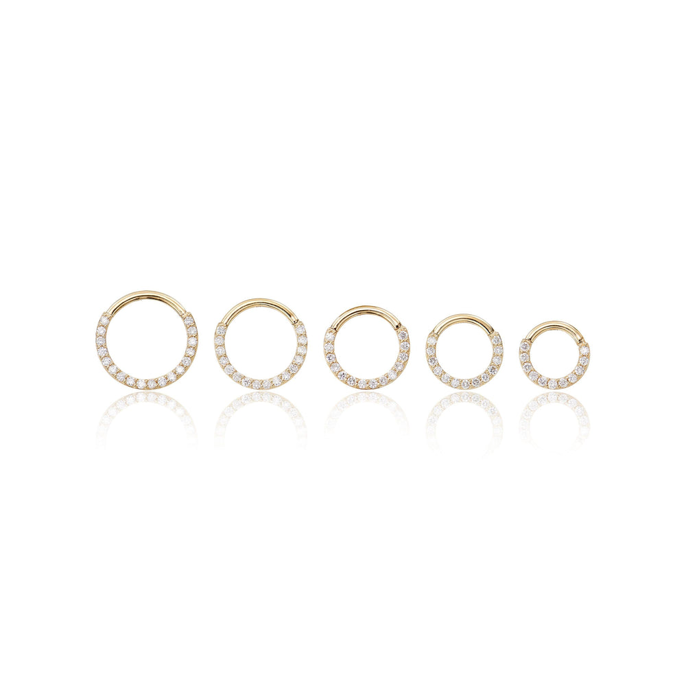 detail close-up of 14K solid gold lab diamond for nose piercing clicker hoop earring 16g nickel-free