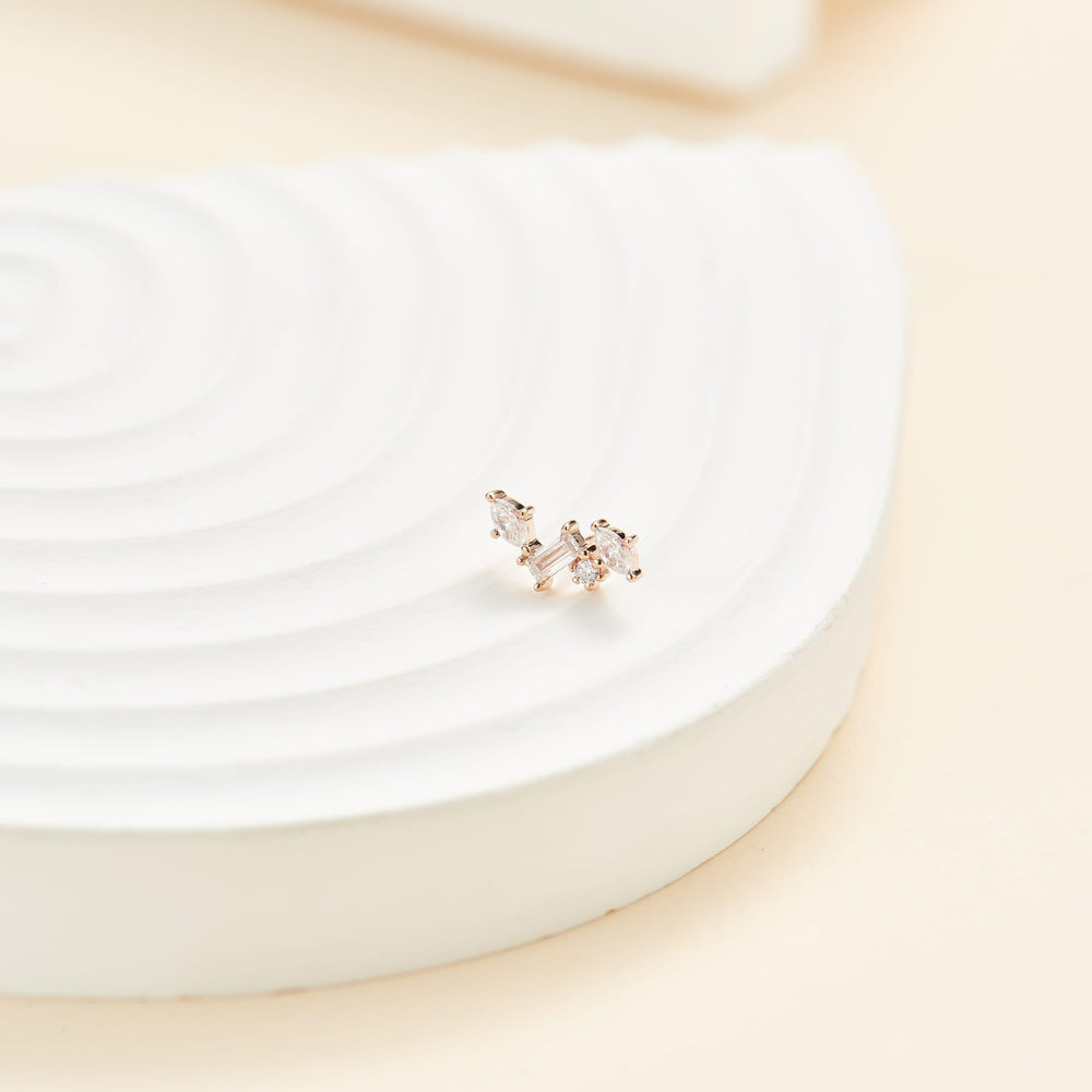 detail close-up of 14K rose gold lab diamond for cartilage piercing flat back stud earring threadless design nickel-free