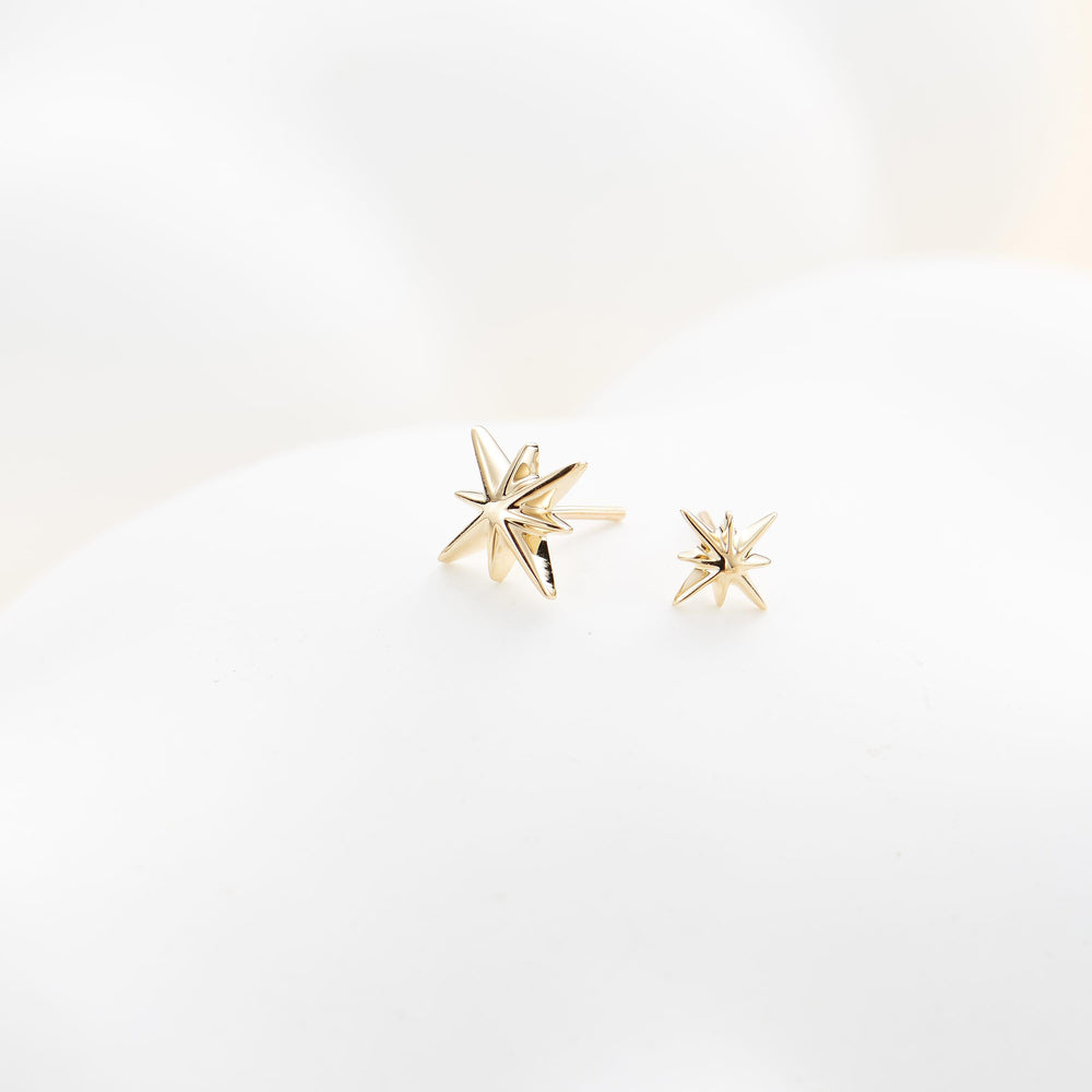 worn on model - 14K solid gold star-shaped flat back stud earring threadless design nickel-free