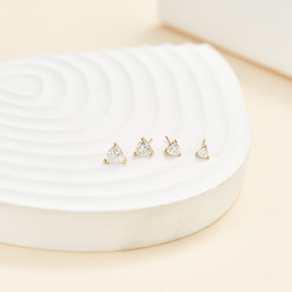 detail close-up of 14K solid gold triangle lab diamond flat back stud earring threadless design nickel-free