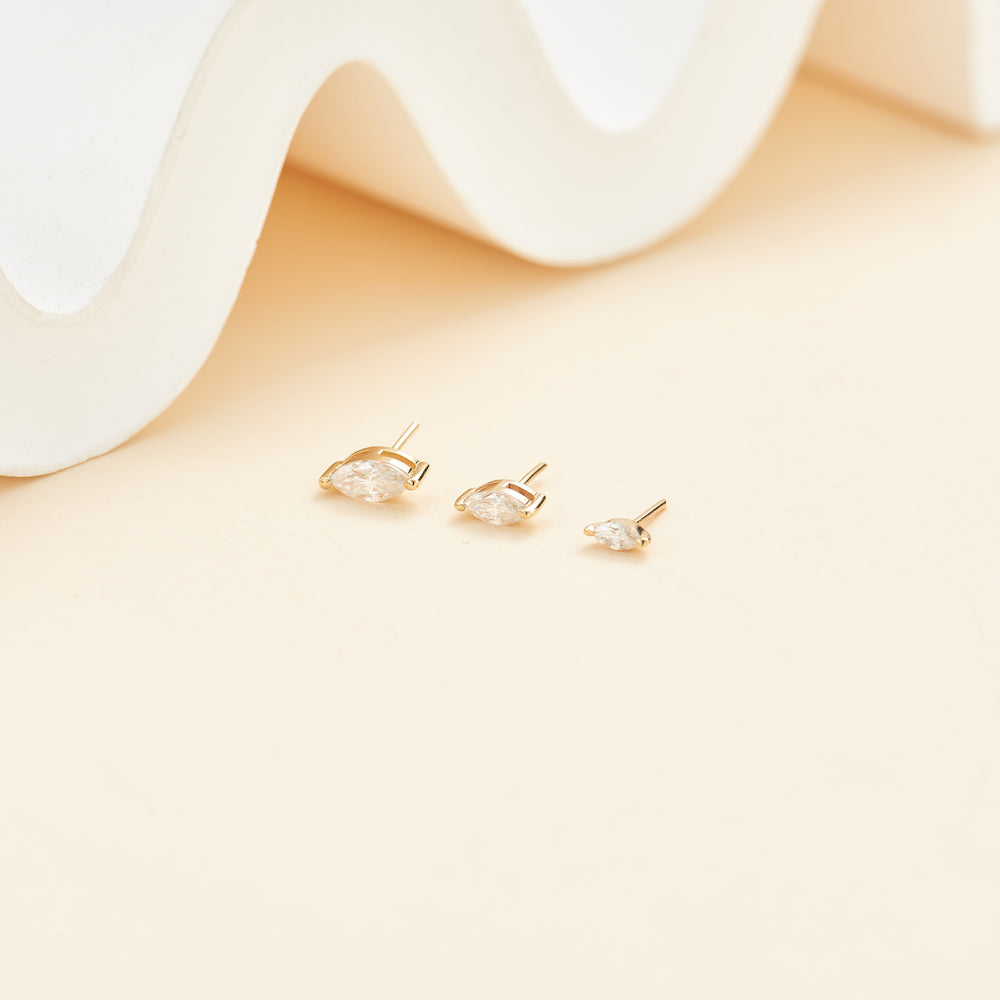 product angle view of 14K solid gold marquise-cut lab diamond flat back stud earring threadless design nickel-free