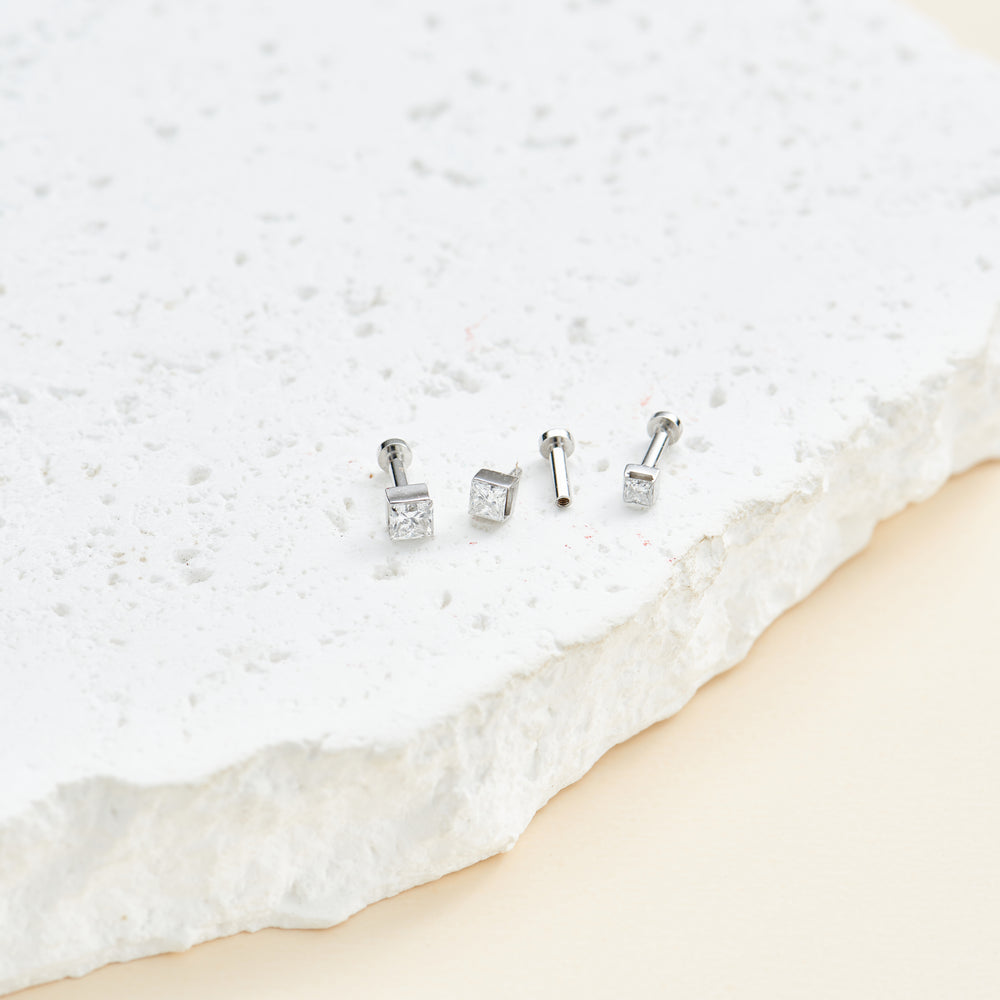 side angle of 14K white gold princess-cut lab diamond flat back stud earring screw back design nickel-free